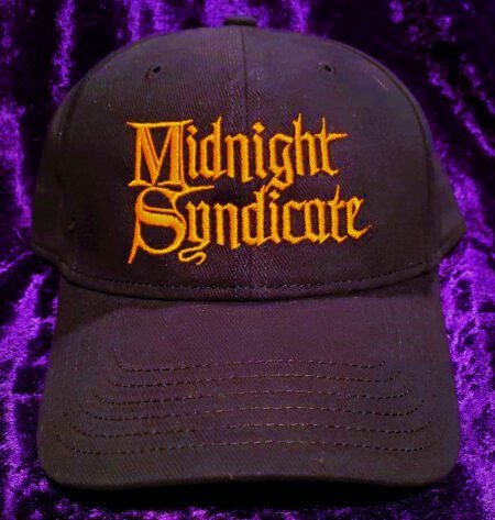 Black hat with Midnight Syndicate logo in orange embroidery